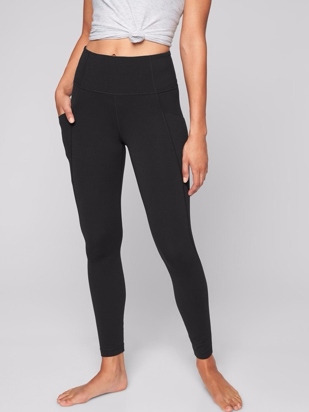 Athleta Stash Pocket Salutation Tight Leggings Black XS